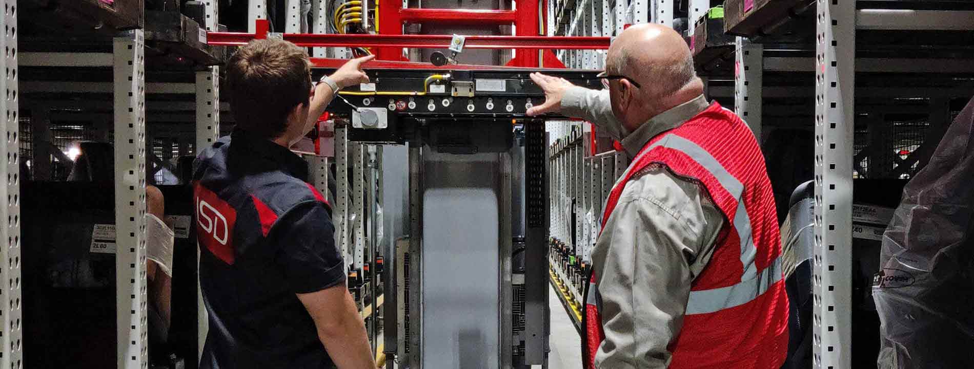 automation consultant talking with customer about asrs