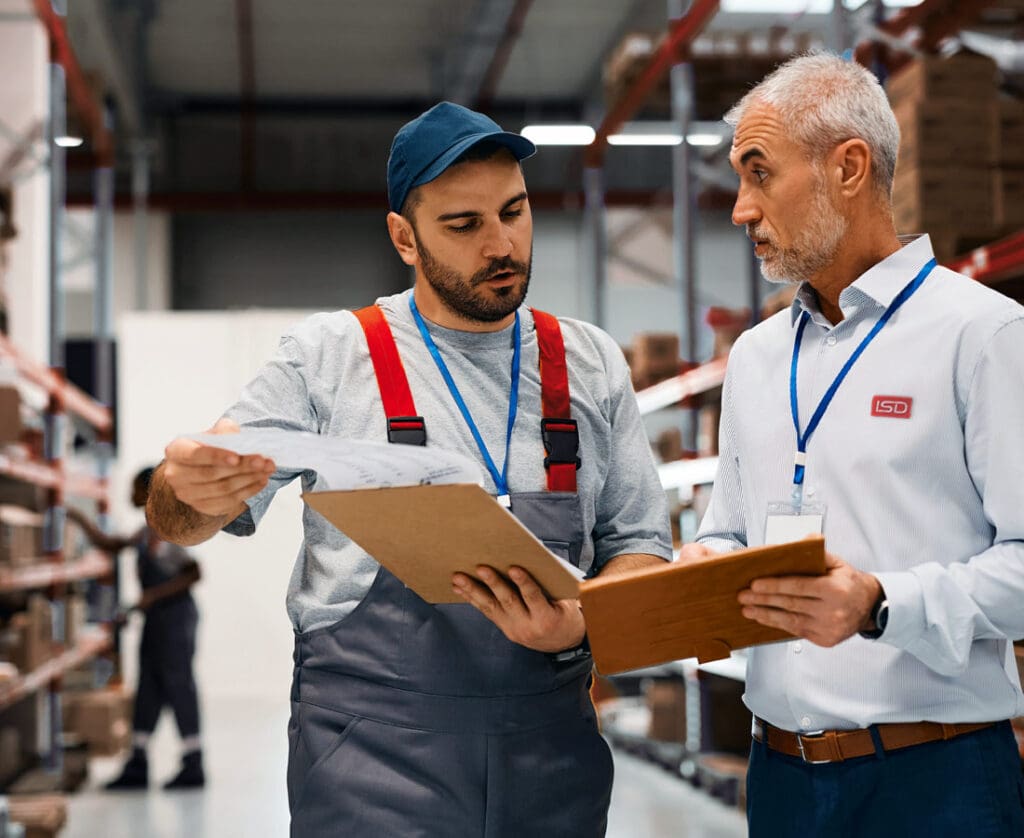 warehouse automation consultant talking with operations manager
