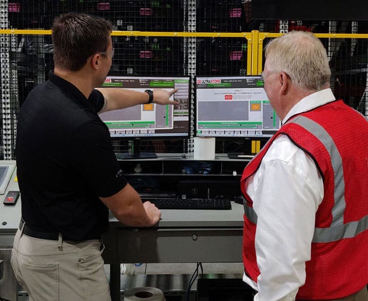training operation manager on control software in warehouse facility