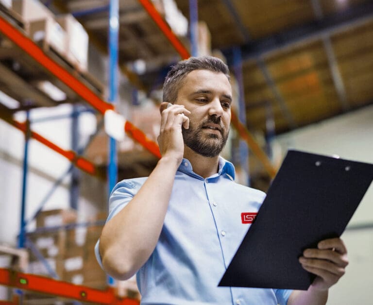 automation consultant installing operation equipment in warehouse